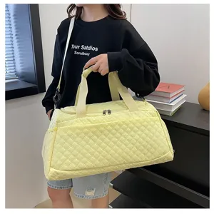 Bolso de viaje acolchado de nailon amarillo grande con correa para hombro para mujeres.