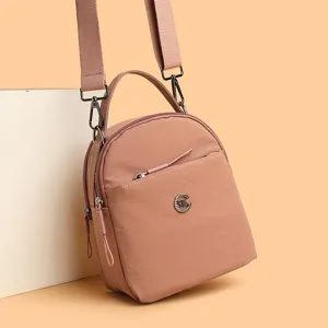 Mochila cruzada mini para mujer de tela oxford ligera bolso bandolera casual bolsillos rosa