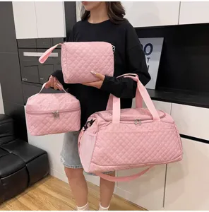 Set de bolsa de viaje de nylon acolchado, bolso de mano rosa ligero de gran capacidad.