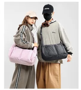 Large capacity nylon shoulder bag, casual waterproof crossbody dumpling bag with pockets.