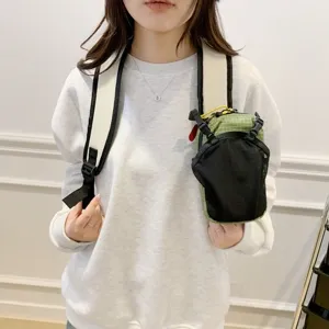 Green waterproof backpack shoulder strap pouch for hiking and climbing accessories.