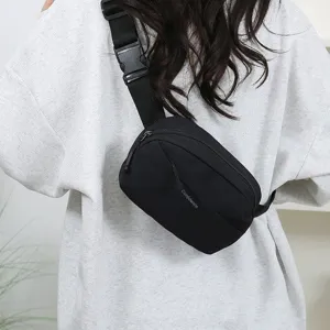 Versatile minimalist black chest bag for men and women, stylish casual outdoor sling pack