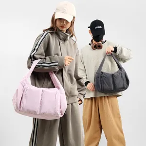 Casual large capacity hobo shoulder bag and waterproof dumpling crossbody bag for daily travel.