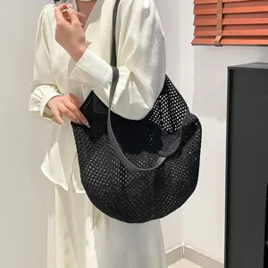 Zwarte gehaakte shopper vintage gebreide schoudertas casual strandtas voor dames.