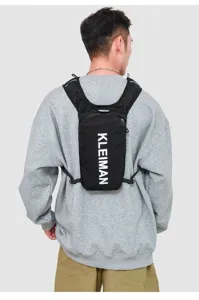 Close-up detail of lightweight black water-repellent running vest backpack with KLEIMAN logo