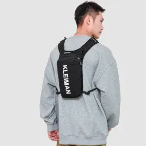 Macro view of a lightweight black sports hydration vest pack for running and cycling.