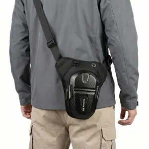 Tactical motorcycle leg bag detail showing carbon fiber hard shell and adjustable straps.