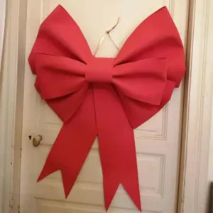 Giant red bow for Christmas tree decoration store display DIY handmade festive hanging pendant.