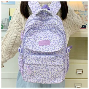 Detailed view of lavender leopard print backpack with large capacity and multi-pockets