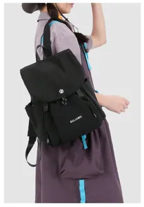 Women's black canvas backpack large capacity travel casual commuter rucksack side pockets detail