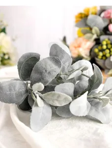Flocked rabbit ear leaf artificial plant branch, textured greenery for home decor details.