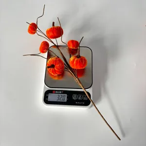 Autumn artificial velvet pumpkin branch decoration for home interior design detail