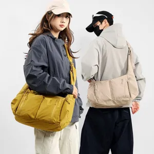 Large capacity waterproof nylon shoulder bag casual crescent dumpling crossbody bag for daily use.