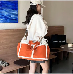 Large orange multifunctional travel bag for gym, fitness and outdoor sports activities