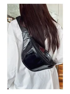Trendy black glossy chest bag, fashionable crossbody bag for daily streetwear and casual outfits.