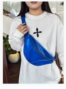 Clear blue fanny pack detail shot, glossy texture crossbody waist bag for daily fashion wear.
