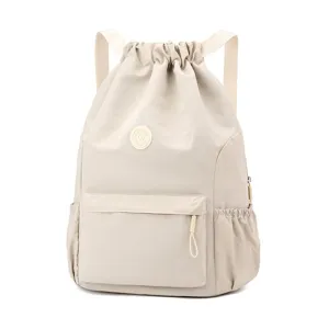 Sac à dos à cordon beige léger et minimaliste pour le sport, le fitness et l'entraînement.