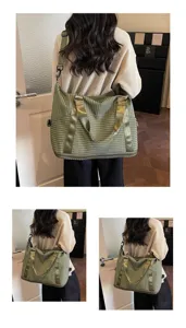 Detailed view of a green checkered large capacity travel bag worn by a model