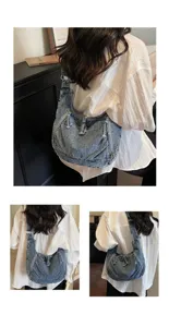 Retro blue denim dumpling shoulder bag for women, shown in a casual lifestyle setting