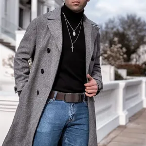 Detailed view of men's brown leather belt with automatic buckle styled with casual wear