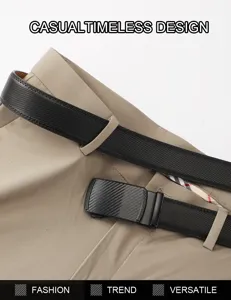 Close-up detail of men's black leather belt featuring a carbon fiber texture automatic buckle