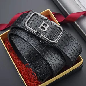Close-up view of a premium men's crocodile leather belt with a silver B buckle in a gift box