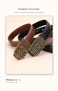 Detail of retro women's leather belt with ornate gold filigree buckle in brown and black