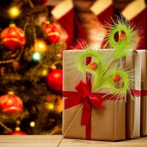 Green artificial feather pick with red balls for Grinch style Christmas tree decor