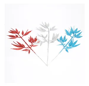 Glitter artificial bamboo leaves for Christmas tree decoration and holiday home decor.