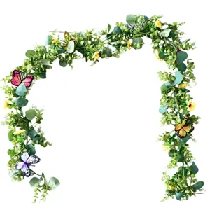 Artificial sunflower vine detail showing lush green leaves, small yellow flowers and butterflies.