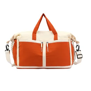 Large capacity orange and cream travel duffel bag for sports and gym use