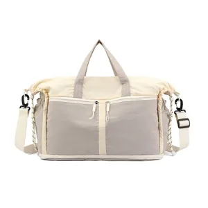Large capacity grey and beige multi-functional travel bag for sports and fitness gym activities