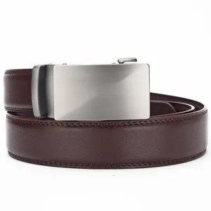 Close-up of men's brown leather belt with silver automatic buckle and grain texture.