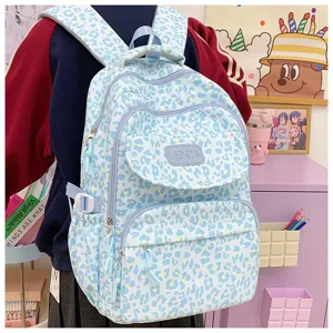 Stylish light blue leopard print large capacity backpack with brand tag for students