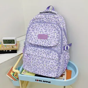 Purple leopard print fashion backpack with large capacity for travel and schools
