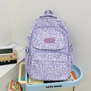 Stylish lavender leopard print large capacity backpack for school students and travel use