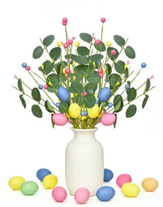 Artificial Easter egg and eucalyptus leaf floral stems for festive spring holiday decoration