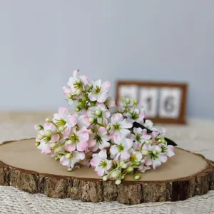 Artificial silk cherry blossom bouquet for home decor, pink white floral arrangement detail view.