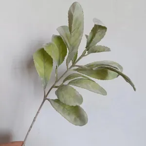 Artificial flocked rabbit ear leaf branch detail shot for wedding floral decor and home arrangement