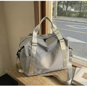 Large capacity grey and white striped duffel travel bag for women fitness and business trips