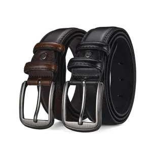 Close-up of textured leather belts in black and brown with brushed metal buckles