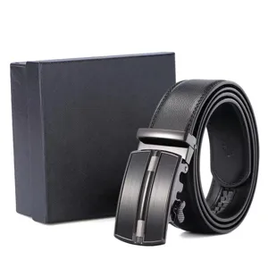 Detail view of a premium men's leather belt with automatic buckle and black gift box