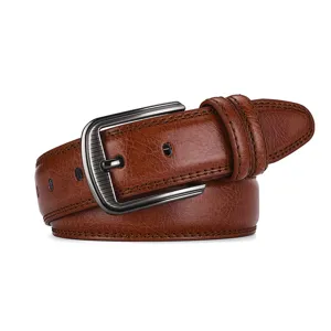 Macro view of a brown genuine leather belt for men featuring a textured finish and metal buckle