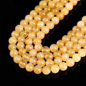 Perles rondes en quartz rutile doré naturel avec aiguilles pour créer des bijoux