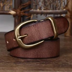 Close-up view of vintage brown leather belt with brass pin buckle and distressed texture
