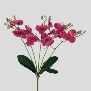 Artificial Phalaenopsis orchid single branch with leaves, perfect for home decor and weddings.