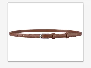 Detailed view of minimalist brown leather belt with silver needle buckle for women