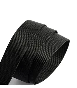 Macro view showing the durable nylon webbing texture of the black tactical belt