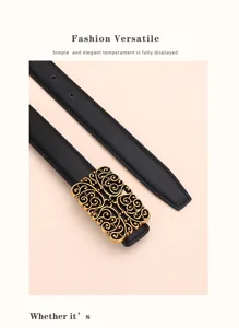 Macro view of vintage gold hollow-carved buckle on elegant black leather belt