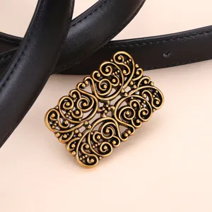 Vintage Maillard style women's black leather belt with antique gold filigree buckle